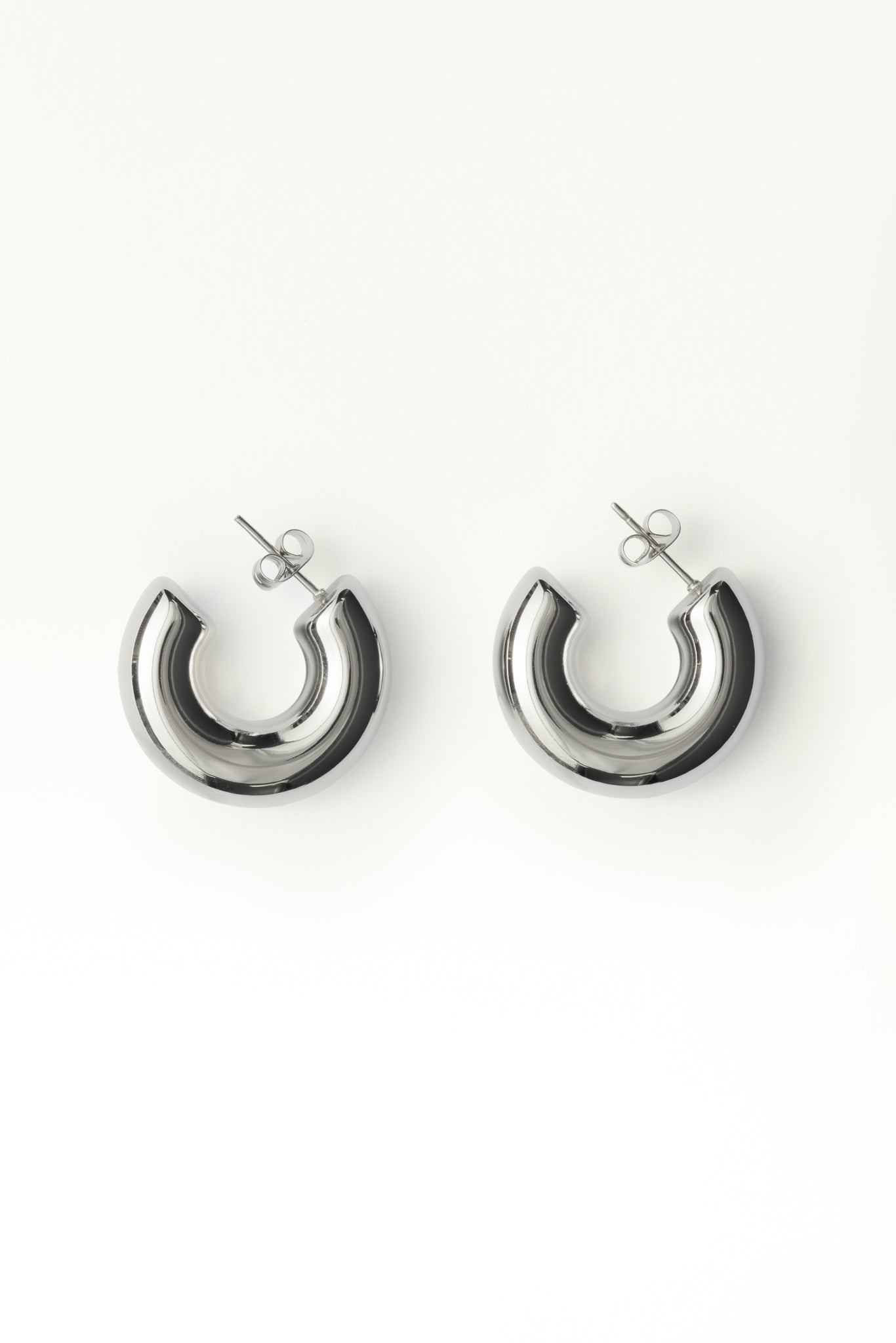 PAIR OF SILVER HOOP EARRINGS OVER