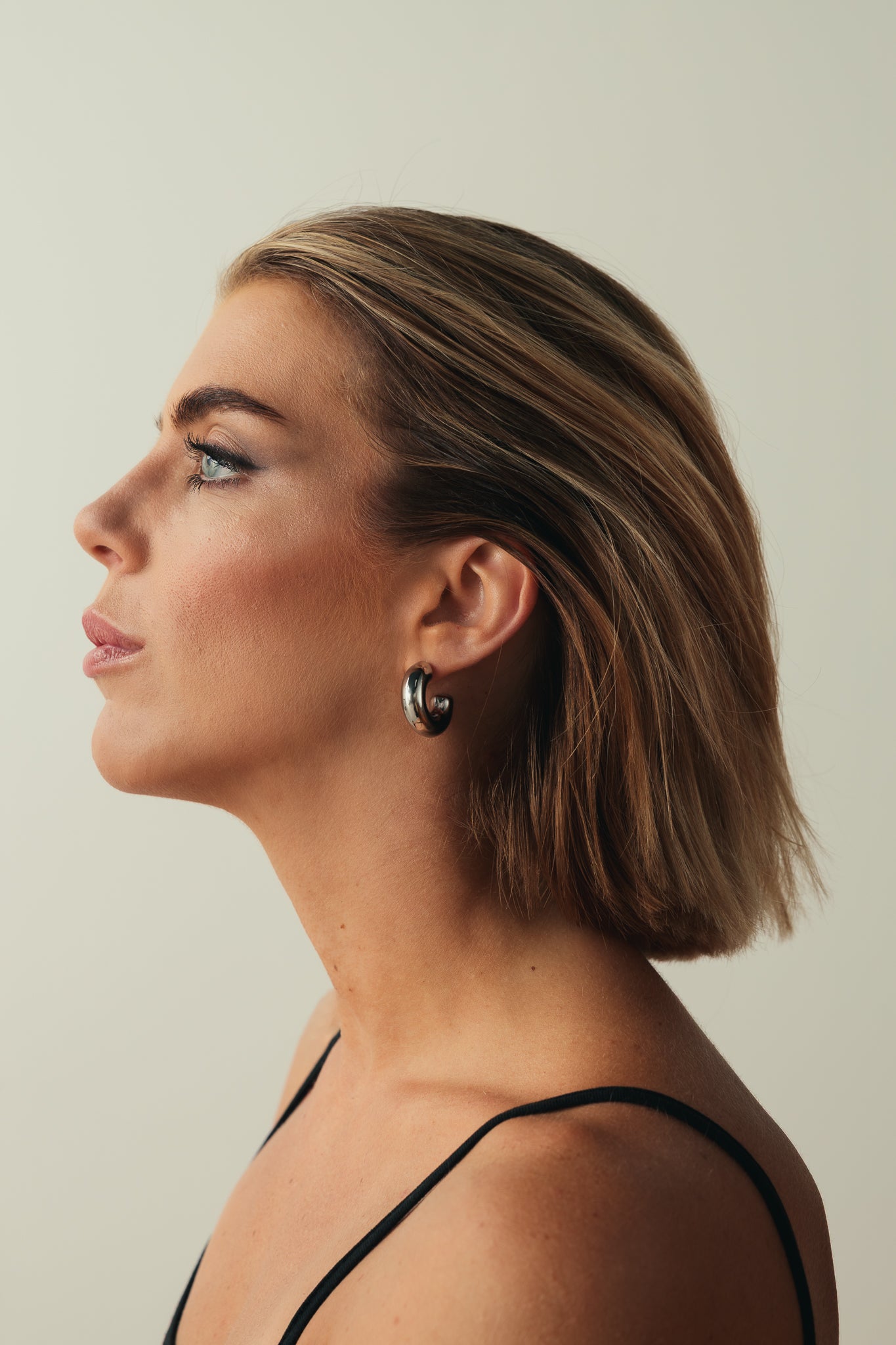 PAIR OF SILVER HOOP EARRINGS OVER