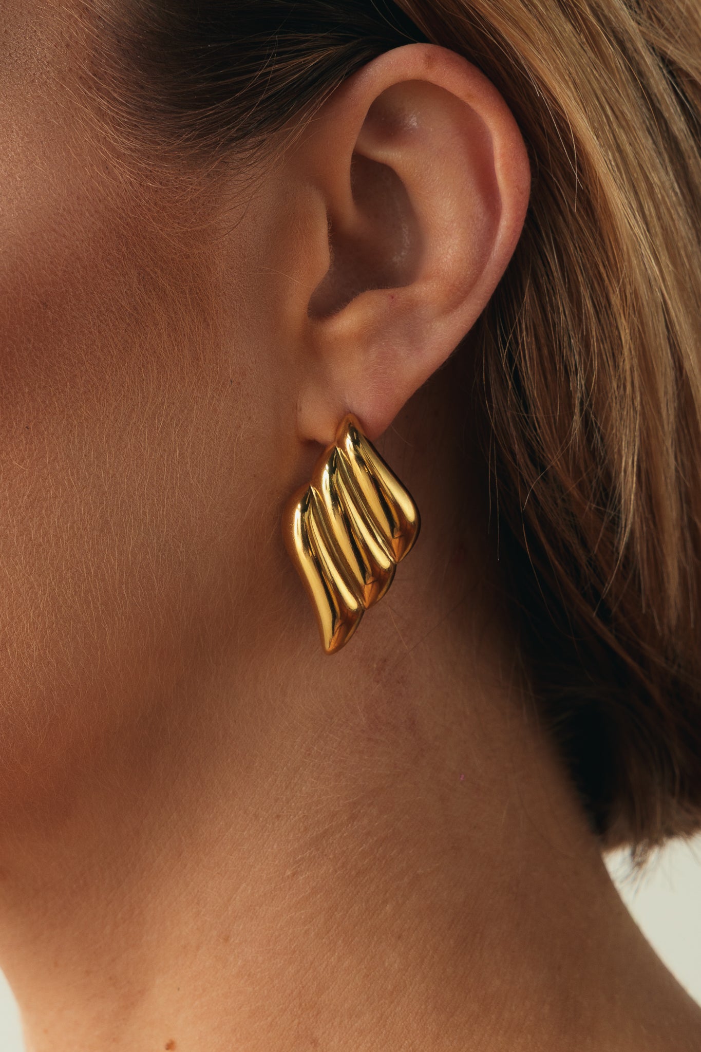 COPPIA ORECCHINI A ONDA OVER