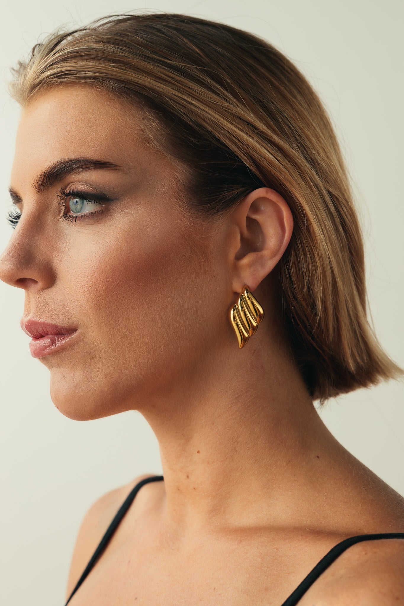 COPPIA ORECCHINI A ONDA OVER