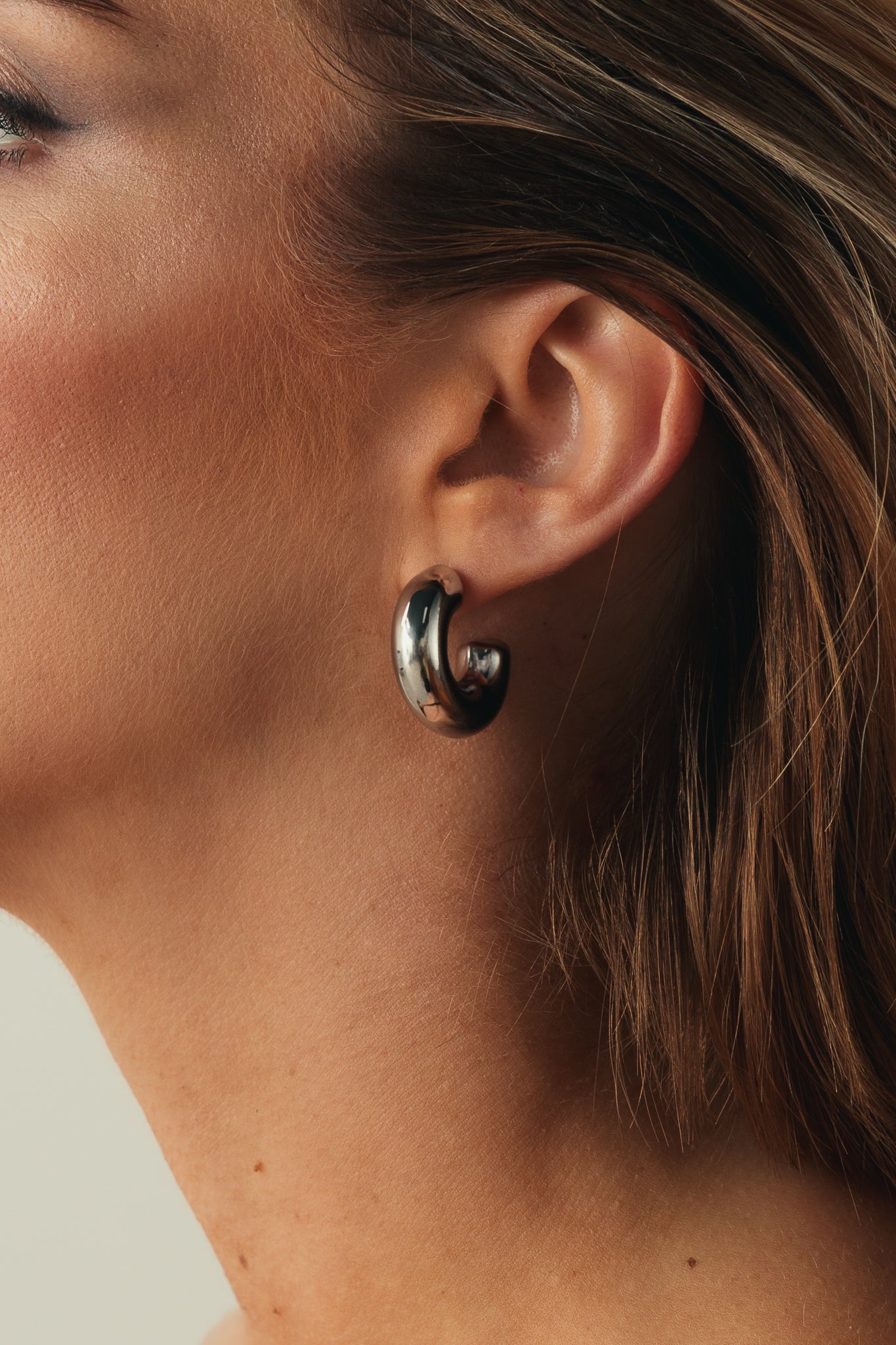 PAIR OF SILVER HOOP EARRINGS OVER